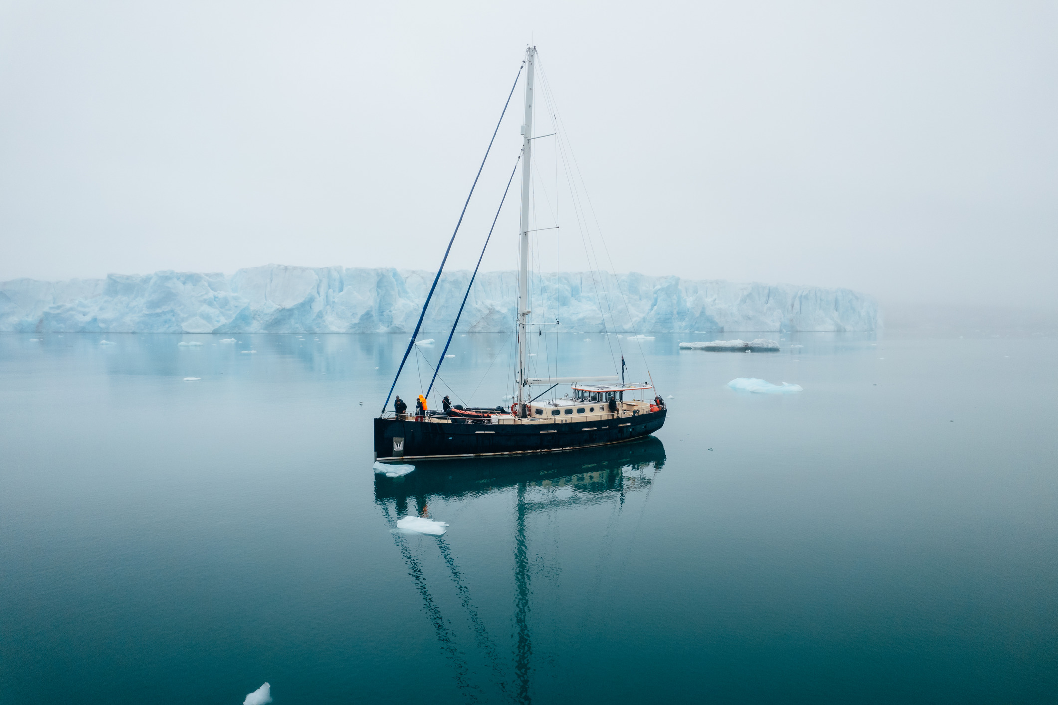 Valiente in front of a glacier in Svalbard, norway