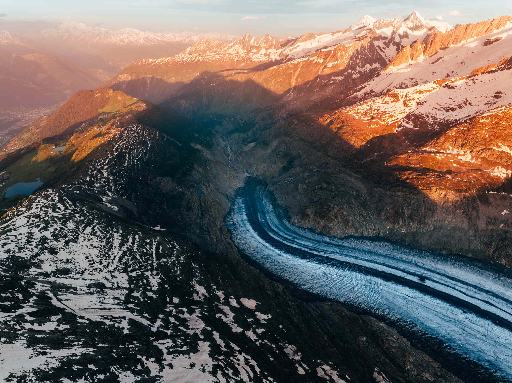 Sunrise over the mountains and a glacier in Switzerland