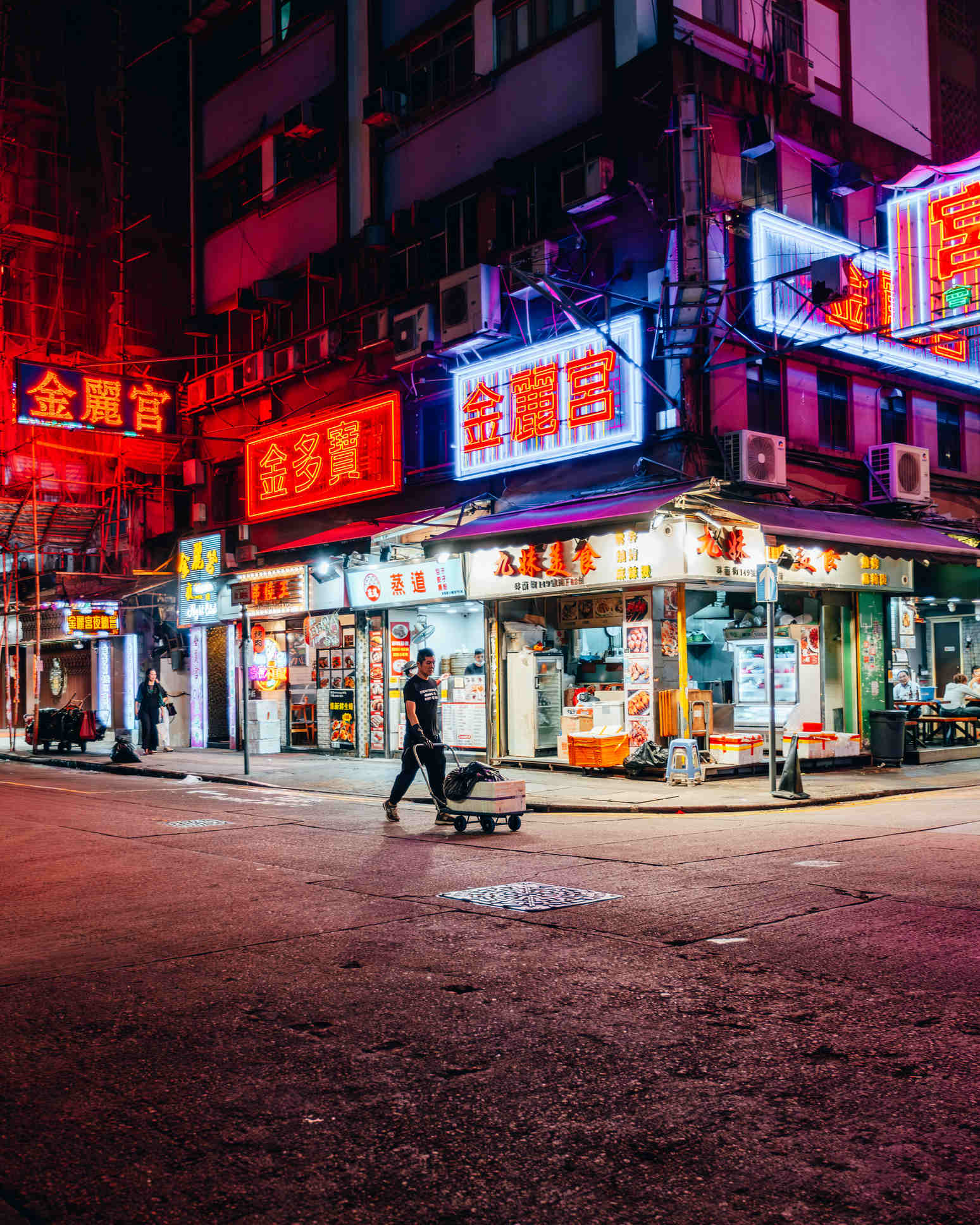 Hong Kong street with neon signs at night