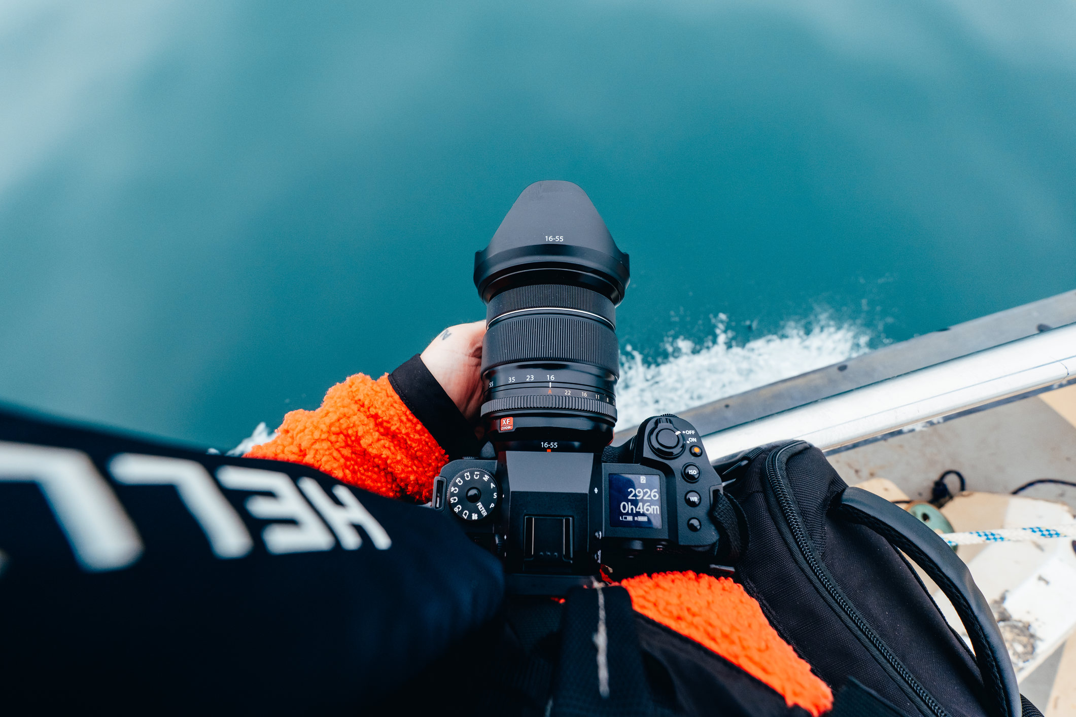 Fujifilm X-H2 camera being held on board a ship