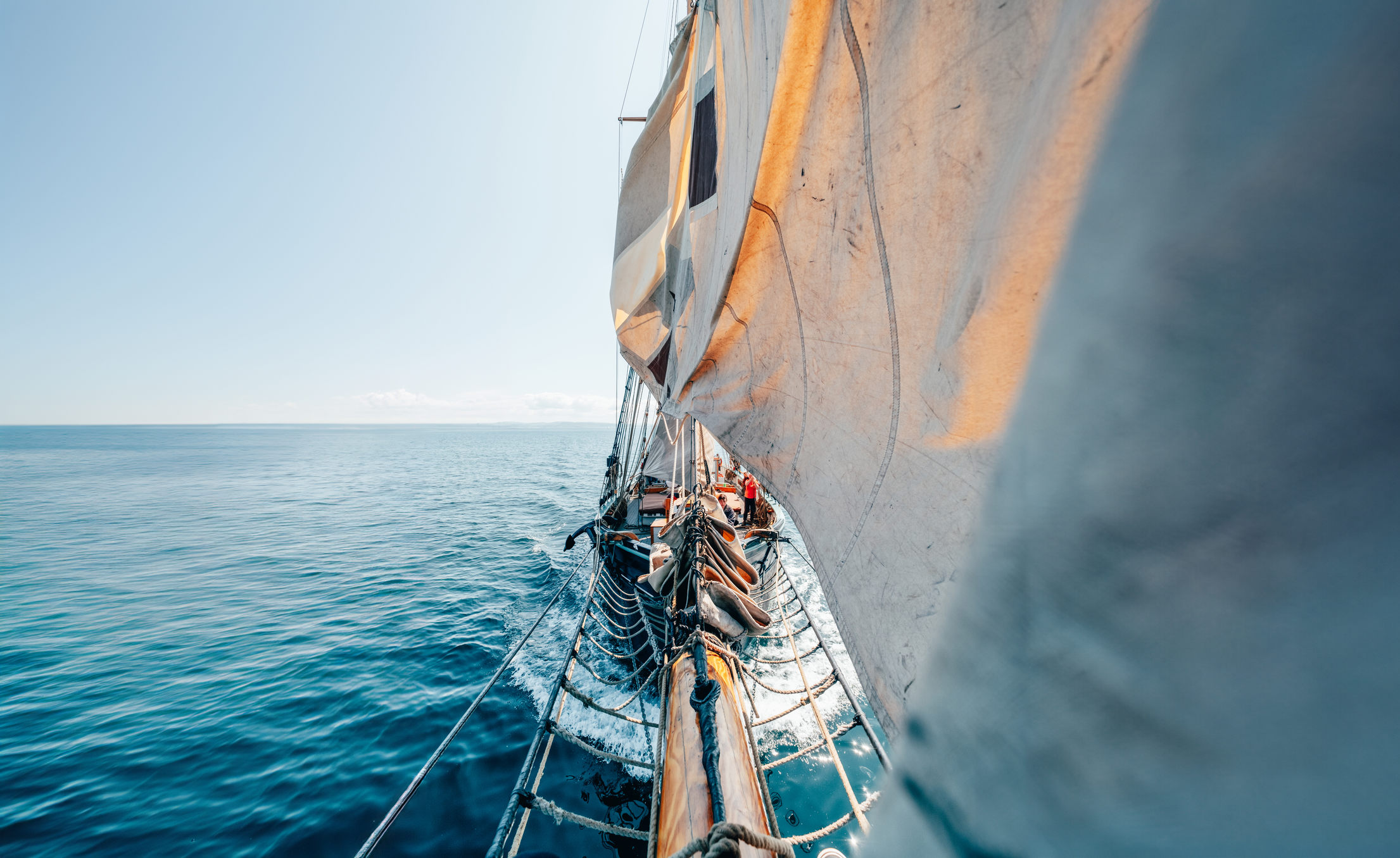 Sat on the bow of a tall ship while they're dropping the sails