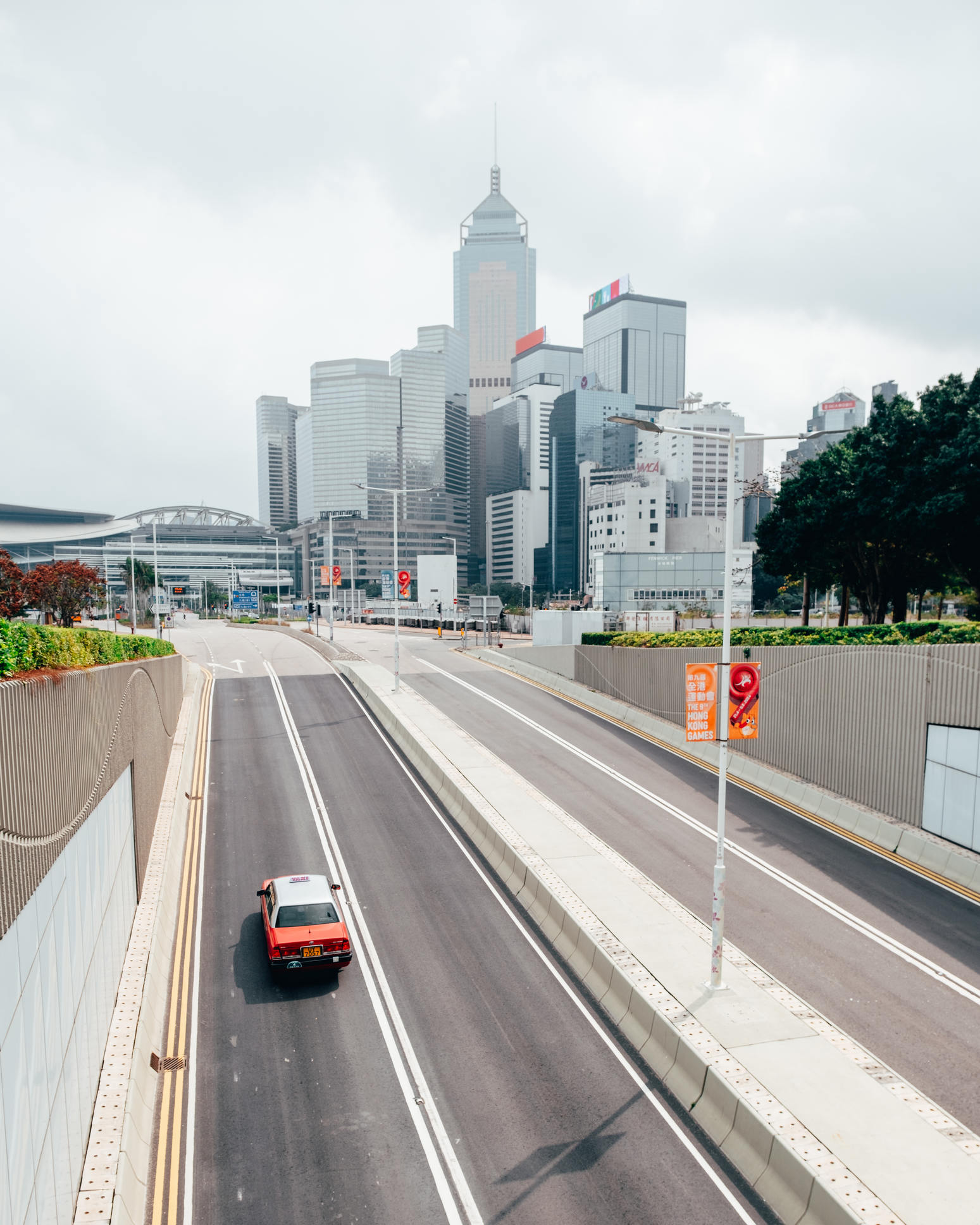 Hong Kong taxi driving towards central plaza