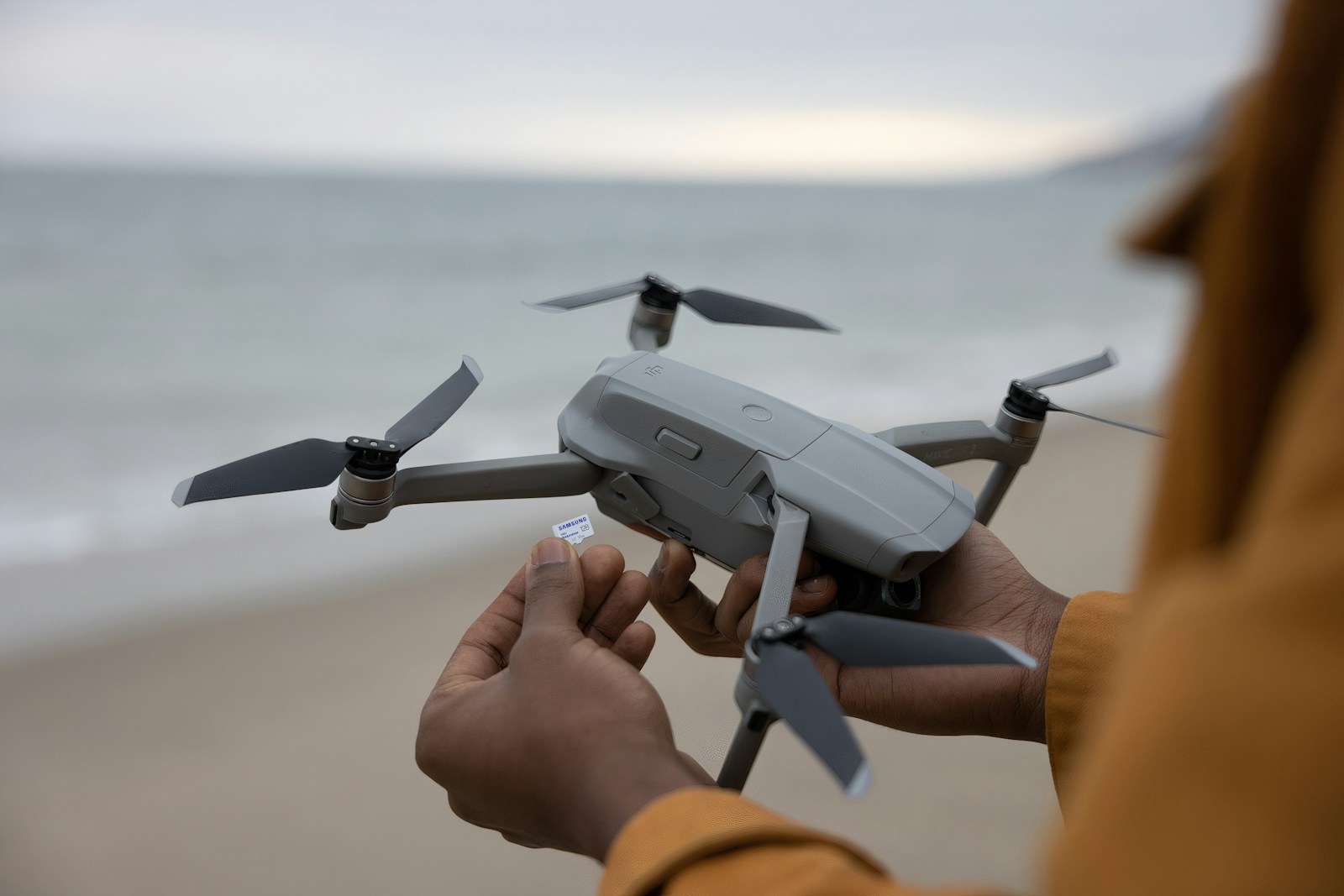 a person holding a drone